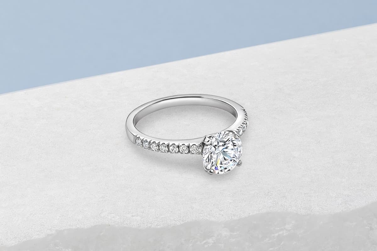 Solitaire with Shoulders Engagement Rings