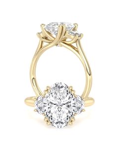 A stunning oval cut diamond ring with half moon side stones in 18ct yellow gold