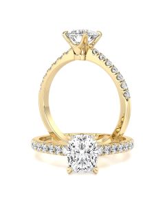 A beautiful elongated cushion cut diamond ring with shoulder stones in 18ct yellow gold
