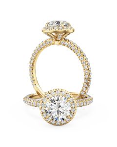 A stunning round brilliant cut diamond halo in 18ct yellow gold