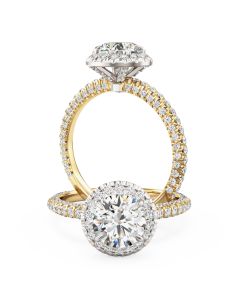 A stunning round brilliant cut diamond halo in 18ct yellow & white gold