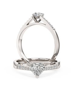 A charming heart shaped diamond ring with shoulder stones in 18ct white gold