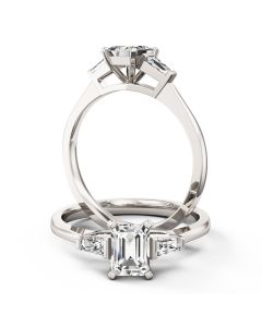 A beautiful emerald cut diamond ring with shoulder stones in platinum (In stock)