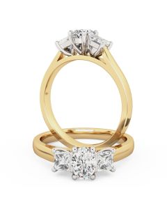 A stunning oval and princess cut three stone diamond ring in 18ct yellow & white gold