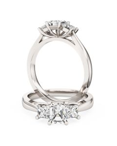 A stunning Emerald & Princess Cut diamond ring in 18ct white gold