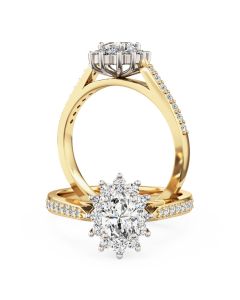 An oval diamond halo with diamond shoulders in 18ct yellow & white gold