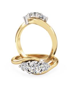A beautiful round brilliant cut three stone diamond ring in 18ct yellow & white gold