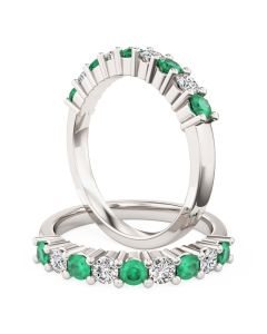 A beautiful emerald & diamond nine stone eternity ring in 18ct white gold