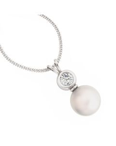 A beautiful 8/8.5mm white pearl and diamond pendant in 18ct white gold