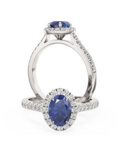 A beautiful sapphire and diamond halo with shoulder stones in 18ct white gold