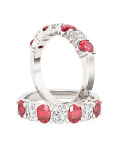 A beautiful seven stone oval cut ruby and diamond eternity ring in 18ct white gold
